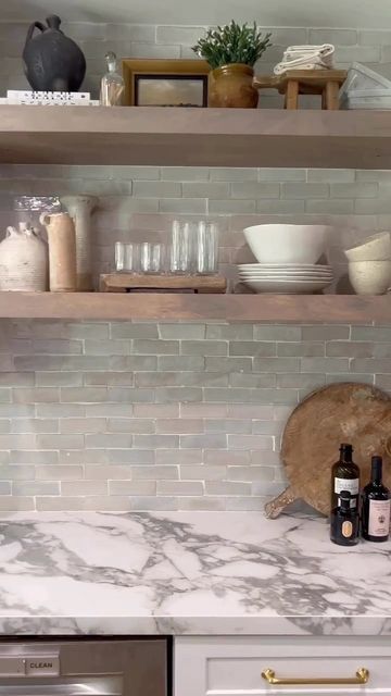 Riad Tile on Instagram: "We hope your weekend plans are as breathtaking as @byangelarose kitchen transformation. Our Natural White 2x6 Zellige featured as the backsplash makes a great pair with that beautiful backyard view. Available online now in the new thinner version. 🎞️: @byangelarose #riadtile #riadtilezellige #zelligenaturalwhite26riadtile #whitetiles #kitchenbacksplash #kitchendesign #kitchenremodel #transformation #interiorstyling #openshelving #weekendvibes #tgif" Gray Zellige Tile Backsplash, Riad Natural White Zellige, Natural White Zellige Tile Kitchen, Riad Tile Natural White Zellige, Circle Kitchen, Riad Tile, Backyard View, Backyard Views, Shelving Ideas