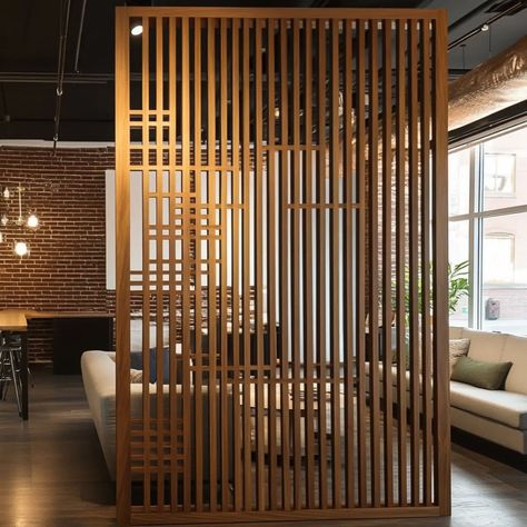 Wood slat wall room divider Wood Slats On Ceiling, Slatted Barn Door, Slatted Wall Divider, Slat Divider Wall, Cottage Breezeway, Slatted Wall Interior, Slat Wall Room Divider, Wooden Slat Wall Living Room, Wood Slat Divider