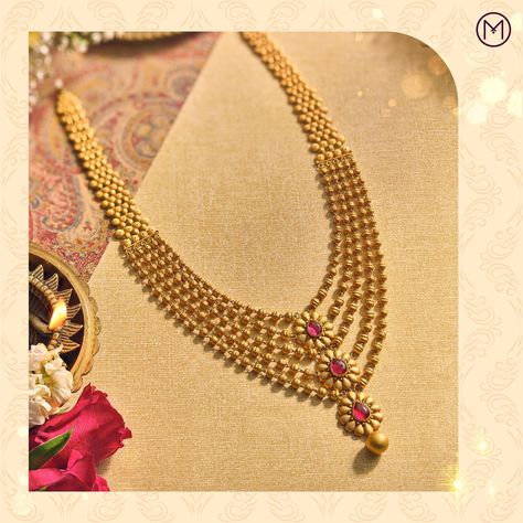 Malabar Gold and Diamonds on Instagram: “Make a stunning fashion statement with this four-line long gold necklace carved in 22k gold. Indulge your inner show stopper with a…” Diwali Fusion Style Gold Pearl Necklace, Traditional 22k Gold Pearl Pendant Jewelry, Gundla Mala, Luxury 22k Gold Traditional Pearl Necklace, Gold Jwellary, Pearl Gold Necklace Bengali, Statement Jewelry Outfit, Gold Pearl Bollywood Necklace, Gold Jewelry Prom