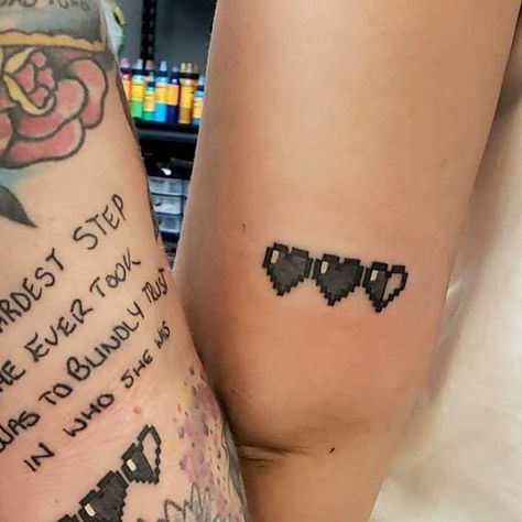 Jaynie on Instagram: "Had a great time doing these matching Zelda heart tattoos today! I can't wait to see you both next time 💕 #tattoo #tattoos #zeldatattoo #bfftattoos" Gamer Heart Tattoo, Game Heart Tattoo, Pixel Hearts Tattoo, Zelda Hearts Tattoo, Duo Matching Tattoos, Video Game Matching Tattoos, Tattoo For Gamers, Zelda Heart Container Tattoo, Matching Gamer Tattoos