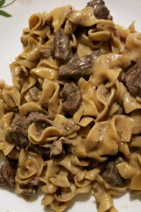 This instant pot beef stroganoff is a quick and easy beef stroganoff recipe! Cook the best instant pot beef recipe using beef stew meat, mushrooms, egg noodles, and sour cream. You will love cooking this beef stroganoff recipe for an easy dinner! Instant Pot Beef Stroganoff Stew Meat Cream Of Mushroom Soup, Instant Pot Beef Stroganoff Easy, Instant Pot Stroganoff Stew Meat, Insta Pot Beef Stroganoff Recipe, Instant Pot Beef Stroganoff With Cream Of Mushroom Soup, Beef Stroganoff Pressure Cooker, Insta Pot Beef Stroganoff Easy, Instant Pot Beef Stroganoff Stew Meat, Beef And Noodles Instant Pot Stew Meat