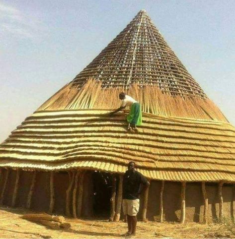 Huge hut called "Luak" being thatched by a woman, the hut is common in the states of South Sudan Thatched House South Africa, Earthship Home Plans, House South Africa, Earthship Home, Thatched House, South Sudan, Nature Tour, Vernacular Architecture, Earthship