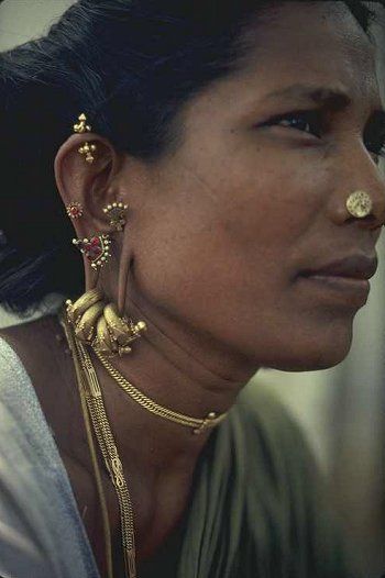 India |  Portrait of a village woman, with her lovely jewellery.  Photo taken in Madurai, Tamil Nadu. | Photographer unknown Creative Rings, Rings Boho, Indian Woman, Indian Aesthetic, Long History, Madurai, Ear Rings, Tamil Nadu, Traditional Jewelry