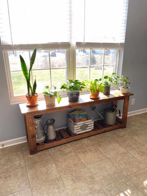 Under Window Table For Plants, Plant Table Indoor Window Diy, Table For Plants Interiors, Long Plant Stand, Shelf Under Window For Plants, Plant Bench Diy, Plant Stands In Front Of Window, Plants Storage Ideas, Plant Tables Indoor