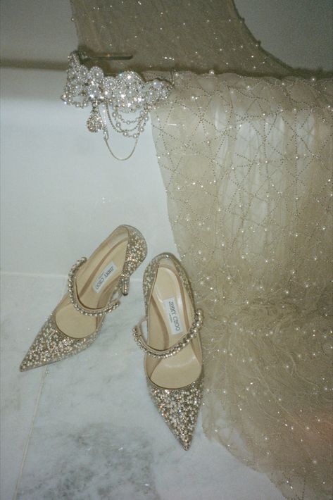 Lace and pearls long sleeve wedding dress paired with Jimmy Choo wedding shoes. While I'm a big fan of the "Bing 100" by Jimmy Choo, I ultimately decided to move forward with the "Baily 100" because i felt that having an enclosed back made me feel more secure. I planned to dance the night away (and i definitely did!) and this shoe was a loyal and painless partner throughout the night. Jimmy Choo Wedding Shoes, Jimmy Choo Bing, Long Sleeve Wedding Dress, Vegas Elopement, Crystal Heels, Sandals Flats, Crystal Shoes, Sleeve Wedding Dress, Wedding Essentials