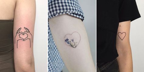 14 Tiny Heart-Shaped Tattoos For An Alternative Valentine's Day- ellemag Hand Holding Heart Tattoo, Holding Heart Tattoo, Girly Tattoo Ideas, Small Side Tattoos, Hand Holding Heart, Small Watercolor Tattoo, Girly Tattoo, Lower Stomach Tattoos, Alternative Valentines