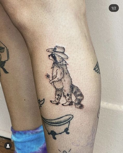 Western Background Tattoo, Rat Cowboy Tattoo, Western Raccoon Tattoo, Rocky Raccoon Tattoo, Remi Wolf Tattoo, Silly Animal Tattoo Ideas, Quirky Animal Tattoo, Raccoon With Cowboy Hat Tattoo, Western Animal Tattoo