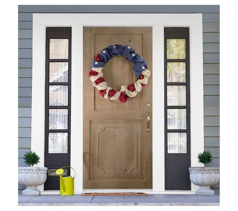 Celebrate your patriotism in a unique and rustic way with this Americana Stars and Stripes burlap wreath. Expertly crafted, this piece beautifully showcases an iconic red, white, and blue motif, making it an ideal decoration for a door, wall, or mantel during Fourth of July festivities. From seasonal celebrations to everyday display, this wreath adds a touch of Americana charm to any space. From Northlight. Americana Wall Decor, Fourth Of July Wreath, Colored Burlap, Changing Table Pad, Material Wreaths, July Wreath, Nursery Chair, Outdoor Bar Table, Tree Shop