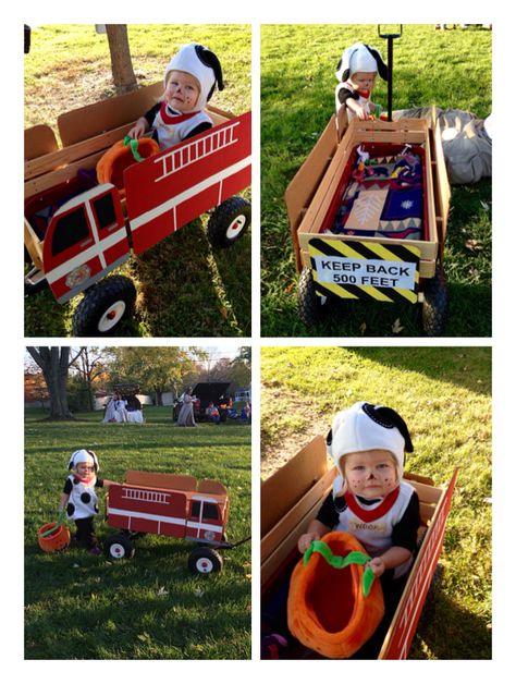 Dalmatian and fire truck costume. I had so many compliments! My husband dressed up as a firefighter and pulled the wagon. Adorable! (I painted the cardboard fire truck and mounted it to our wagon using foam adhesive tape. Bought the puppy costume from Pottery Barn.) Diy Fire Truck Cardboard Wagon, Fire Truck Diy Cardboard Boxes, Fire Truck Wagon Costume, Halloween Fire Truck Wagon, Wagon Fire Truck Halloween, Diy Firetruck Wagon Cardboard, Firetruck Wagon Diy, Wagon Fire Truck Diy, Firetruck Wagon Halloween