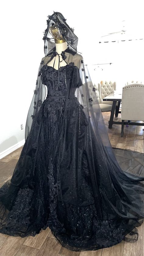 Sleeveless black ballgown wedding dress with hooded veiled cape. Victorian Goth Prom Dress, Black Wedding Dress Veil, Prom Dress With Hooded Cape, Prom Dress With Hood, Black Wedding Dress Ballgown, Black Wedding Dresses Gothic, Emo Wedding Dresses, Midevil Dress, Off Shoulder Prom Dresses