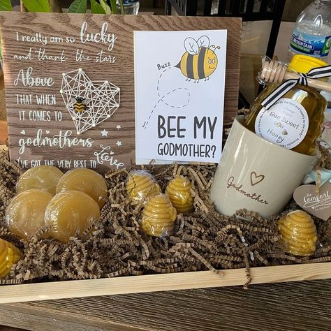 How cute is this little bee themed godmother gift set up featuring my 'Bee My Godmother' card 😍 "The card worked perfect for my bee themed Godmother gift. I was super happy with the quality of the card." Tanya, Etsy 👉🏻 https://www.teepeecreations.co.uk/product/cute-godmother-proposal-bee-card/ #TeePeeCreations #Bee #Godmother #SmallBusiness Godmother Proposal, December Birthday, Modern Card, Bee Cards, Godmother Gifts, Simple Website, Christmas Post, Bee Theme, Super Happy