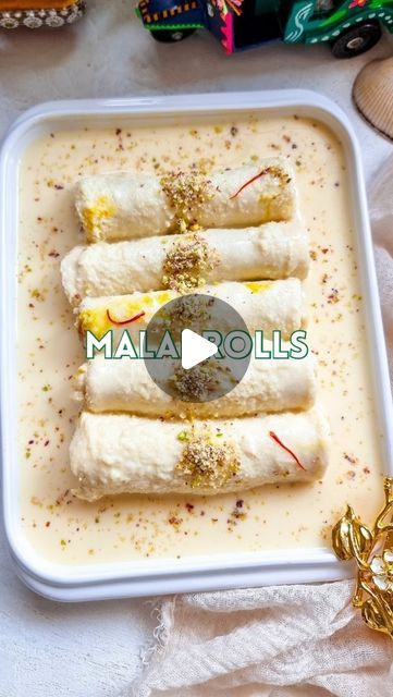 Rafia Mazhar | Easy Recipes | Home Chef on Instagram: "Malai Rolls Recipe ⤵️

Easy Desserts - Ras Malai Rolls 🍨

Khoya Filling
1 tsp ghee
1/3 cup milk
1/2 cup milk powder (not tea whitener)
1/8 cup cream
1.5 tbsp sugar
1/2 tsp cardamom powder
1.5 tbsp finely chopped nuts

• In a pan add the ghee, milk and milk powder. Cook till it is thickened but not too thick 
• Add the remaining ingredients and mix well. The filling should leave the sides of the pan & be spreadable (it will also thicken as it cools)

Custard Milk
1 cup milk
2 tbsp sugar
1/2 tsp kewra water
Few strands saffron
1 tbsp custard powder dissolved in water

• Bring the milk and sugar to a boil. Add in the custard powder and make a thin custard
• Add the kewra and saffron. Mix well
• Cool completely at room temperature (keep s Custard Powder Recipes, Ras Malai, Rolls Recipe Easy, Milk And Sugar, Custard Powder, Cardamom Powder, Handmade Embroidery Designs, Milk Powder, Handmade Embroidery