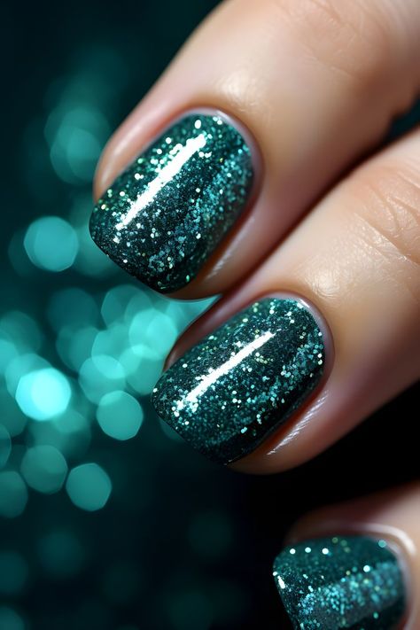 dark green nails, glittery nail ideas, nail design inspiration, nail art, holiday manicure, festive nails, stylish nails, nail trends, nail inspo, seasonal nails, sparkly nails, nail goals, nail aesthetics, trendy nails, nail looks, nail colors, nail glam, nail vibes, nail style, nail obsession, nail magic, nail love, nail beauty, nail elegance, nail charm, nail allure Glittery Nail Ideas, Green Christmas Nail Ideas, Green Christmas Nail, Nail Art Holiday, Green Christmas Nails, Nail Aesthetics, Nail Vibes, Nail Glam, Dark Green Nails