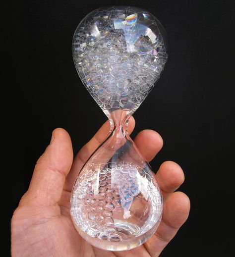 Filled with specially formulated soapy water inside a hand-blown glass hourglass shape, this mesmerizing bubble watch is designed to waste time as the bubbles randomly rise up, not count it down like falling grains of sand would. AKA cool time waster. Funny Gadgets, Hourglass Timer, Sand Clock, Japan Gifts, Hourglasses, Sundials, Sand Timers, Soap Bubbles, Cool Gadgets