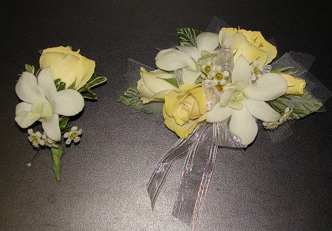 Yellow Corsage Yellow Corsage, Corsage For Yellow Prom Dress, Corsage Prom White And Gold, Yellow Flower Corsage, Yellow Corsage And Boutonniere, Light Yellow Corsage, White Corsage, Prom Flowers Corsage, Prom 2020