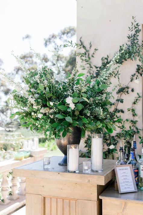 Buffet Flower Arrangements, Large Greenery Arrangements, Greenery Bar Decor, Bar Arrangement Wedding, Spanish Moss Wedding Centerpiece, Spanish Moss Floral Arrangements, Greenery Floral Arrangements, Cocktail Arrangements, Bar Floral Installation