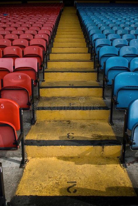 Soccer football stadium seats in blue and red with yellow stairs. royalty free stock photos Yellow Stairs, Stadium Seats, Vector Frame, Football Fashion, Painted Stairs, Football Stadium, Football Stadiums, Football Field, Yellow Painting