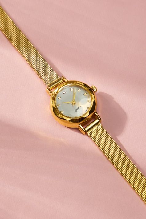 This dainty round face watch, features a slim gold mesh wrist band. Slim in style, this watch is perfect to add to a wrist stacked with bracelets or alone for a sophisticated style. Slim Watches, Wrist Stacks, Timeless Watches, Small Watch, Gold Watches Women, Wrist Band, Jewelry Lookbook, Mini Dress Shop, Christmas Gifts For Women