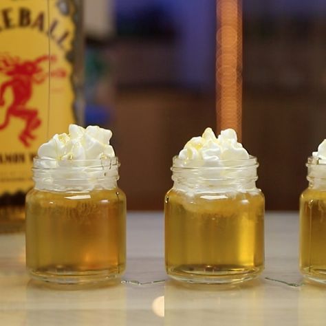 Folks looking for some awesome little cinnamon whiskey shooters will love these Hot Lil Honey Shots. These sweet dessert shooters combine cinnamon whiskey, honey whiskey, and hazelnut liqueur, and are garnished with some whipped cream and honey for extra sweet cocktail goodness. Honey Whiskey Cocktails, Honey Shots, Honey Cocktails, Dear Alcohol, Bartending Ideas, Birthday Cake Shots, Jungle Juice Recipe, Honey Whipped Cream, Whiskey Cocktail Recipes