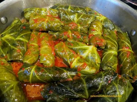 Stuffed winter greens or Swiss chard with ground meat and rice in hot pepper sauce - delicious Stuffed Swiss Chard, Ground Meat And Rice, Tomato Paste Sauce, Stuffed Vine Leaves, Mint Yogurt, Winter Greens, Hot Pepper Sauce, Hot Pepper, Signature Dishes