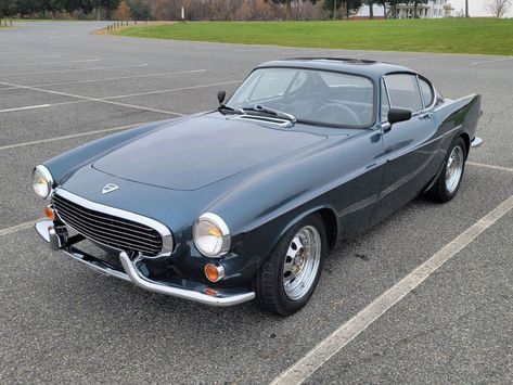 One of the 23,993 examples of the car produced during its model lifespan, this 1965 Volvo P1800S is described by its selling dealer as a “no issues” vehicle, which appears to have undergone a... Volvo P1800s, Volvo Cars, American Cities, Volvo, Cool Cars, Bmw Car, Sports Car, Trucks, Road