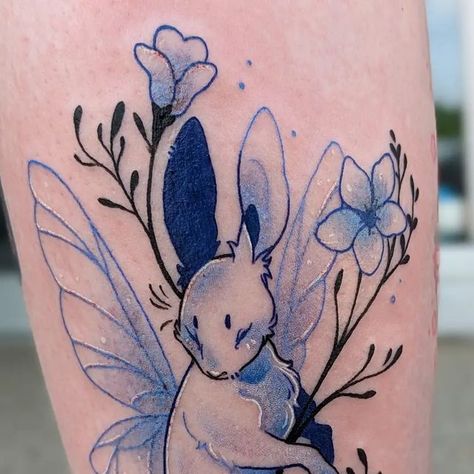 Rosie Cole on Instagram: "Blue 👏 Bunny 👏 Fairy 👏 I love how this tattoo turned out so much 💖 Color + thing is always a fun time. Thanks for getting another bun, Alexa! Took about 2 hours . . . . . . . #michigantattooers #michigantattooartist #midwesttattoo #detroittattooartist #bunnytattoo #bunny #bluetattoo #cutetattoo #pasteltattoo" Fairy Bunny Tattoo, Black Bunny Tattoo, Cute Bunny Tattoo, Bunny Tattoo Design, Easter Tattoo, Tattoo Rabbit, Hase Tattoos, Fairy Bunny, Bunny Fairy