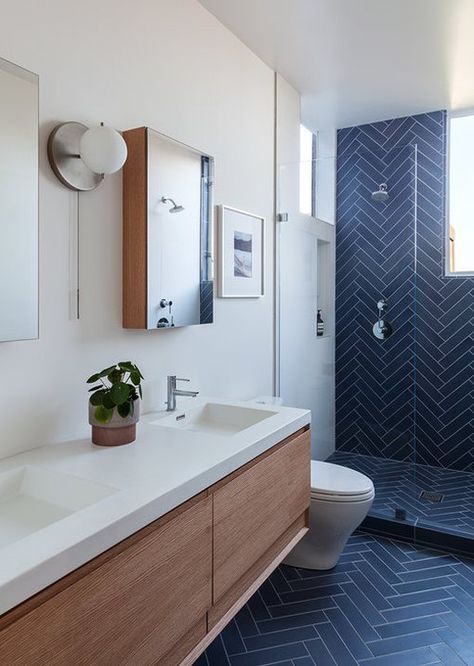 navy blue ceramic tile in herringbone pattern on bathroom wall and floor Makeover Kamar Mandi, Navy Bathroom, Blue Bathroom Decor, Interior Vintage, Bathroom Tile Designs, Blue Bathroom, Bathroom Floor Tiles, Bathroom Tile, House Bathroom