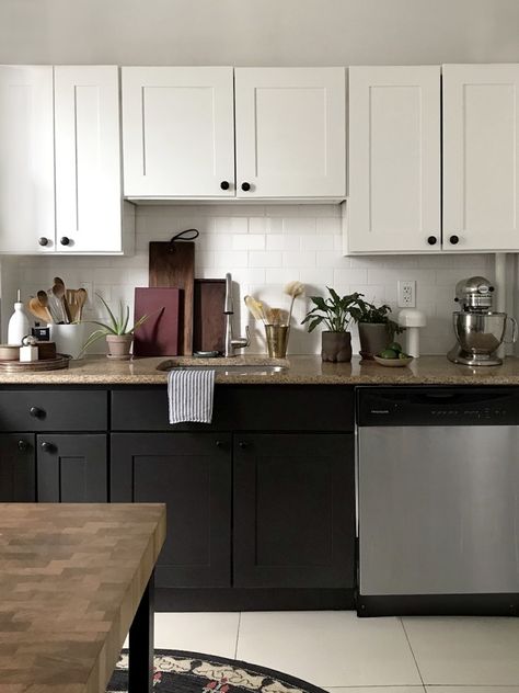 Black And White Painted Kitchen Cabinets, Black Bottom Cabinets Kitchen, Black And White Kitchen Cabinets Painted, Half Black Half White Kitchen Cabinets, Black Bottom Kitchen Cabinets White Top, Lower Black Kitchen Cabinets, Simple Black Kitchen Cabinets, White And Black Cupboards, White Kitchen With Black Cabinets