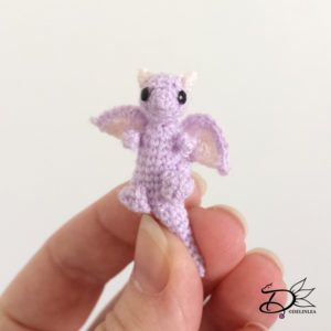 I decided to challenge myself! I tried to crochet something small, like miniature small! Check how that turned out, and I'm callenging you as well! Mini Dragon Amigurumi Free Pattern, Crochet Dragon Keychain Pattern Free, Pocket Dragon Crochet, Tiny Crochet Dragon, Tiny Dragon Crochet Pattern Free, Miniature Crochet Animals, Crochet Mini Dragon Free Pattern, Crochet Mini Dragon, Crochet Dragon Keychain