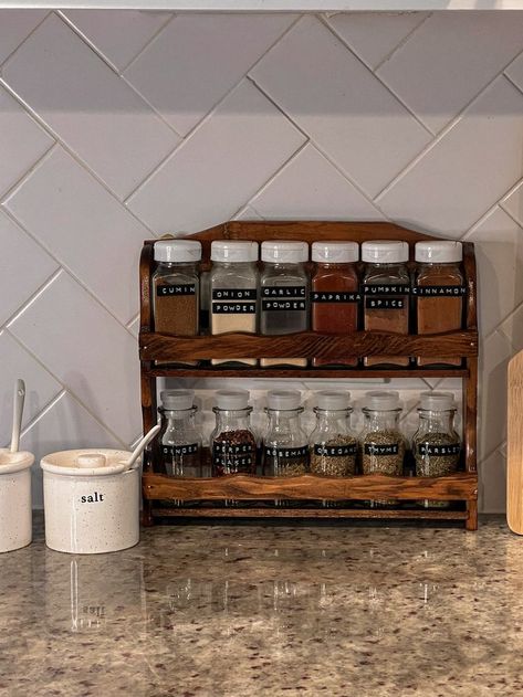 My new little thrifted vintage spice rack 🥹 #thriftedhome #neutralhome #neutralhomedecor #homedecoronabudget #budgethomedecor #moderncottage #rustichome #vintagedecor #spicerack #vintagefinds #thriftfinds #kitchendecor Boho Spice Rack, Spice Organization Countertop, Spice Rack Aesthetic, Cottagecore Spice Rack, Cottage Core Spice Rack, Vintage Kitchen Organization, Antique Spice Rack, Thrifted Home Aesthetic, Styling Thrifted Decor