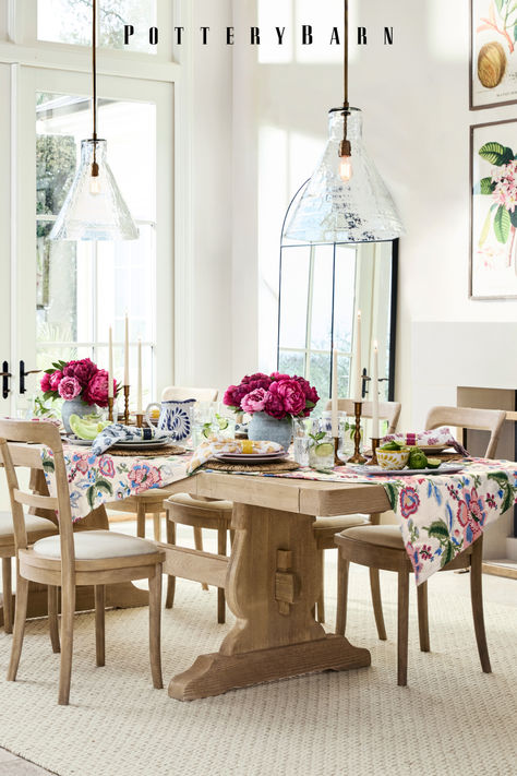 Upgrade your summer soirées with a vibrant table setting featuring a mix of patterns, prints and bold colors. Tap for more table setting inspiration! Floral Pattern Dining Table And Chairs, Pottery Barn Dining Room, Dream Dining Room, Small Entryways, Table Setting Inspiration, Dining Room Living Room, Extendable Dining Table, Upholstered Dining Chairs, Pottery Barn