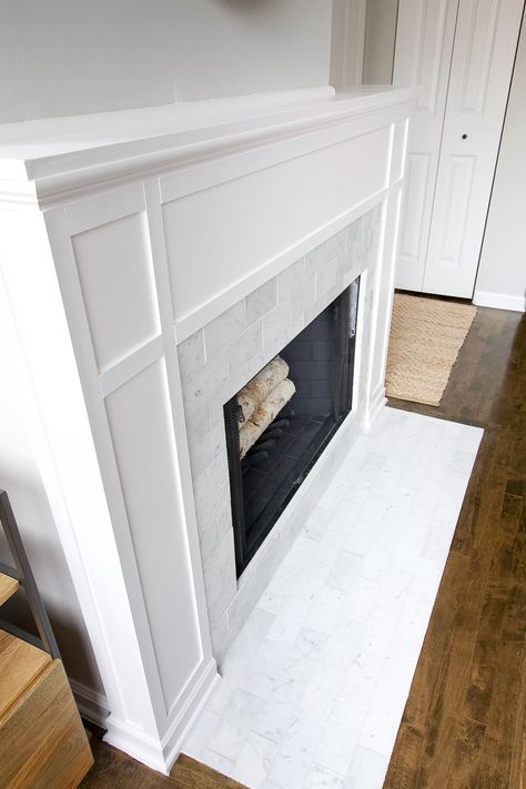 White Tile Around Fireplace, Half Fireplace Ideas, White Marble Tile Fireplace, Fireplace Makeover Craftsman Style, Marble Fireplace Tile, White Fireplace Hearth, Fireplace With Marble Surround, Fireplace Marble Tile, Fireplace Surrounds Tile