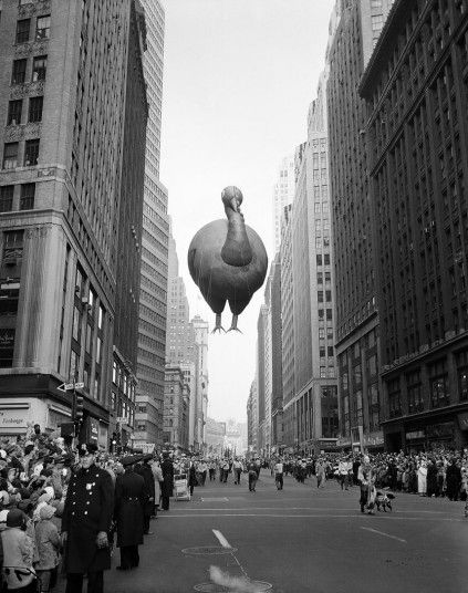 1957: A giant floating turkey balloon squeezes between buildings as the 31st annual Macy's Thanksgiving Day Parade moves down Broadway near ... Macy's Parade, Macy's Day Parade, Macys Thanksgiving Parade, Macy’s Thanksgiving Day Parade, Macys Parade, Thanksgiving Facts, Tom Turkey, Thanksgiving Parade, Timeless Photography