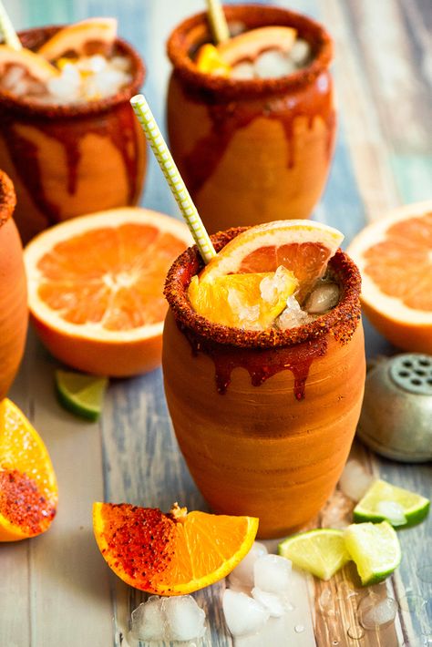 Cantaritos or jarritos. This refreshing drink will cool you off during the hot summer months. Made with three different kinds of citrus juice, tequila blanco and grapefruit soda. Jarritos Drink Tequila, Mexican Cocktails, Mexican Drinks, Grapefruit Soda, Tequila Drinks, Michelada, Clay Cup, Citrus Juice, Alcohol Drink Recipes