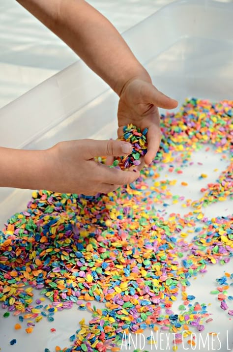 Sensory play for kids using rainbow dyed oats from And Next Comes L Dry Messy Play, Dyed Spaghetti Noodles Sensory Play, Dye Pasta For Sensory Table, Rainbow Oats Sensory Play, Dyed Rice Sensory Bin, How To Make Coloured Rice Sensory Play, Sensory Tubs, Sensory Art, Reindeer Food