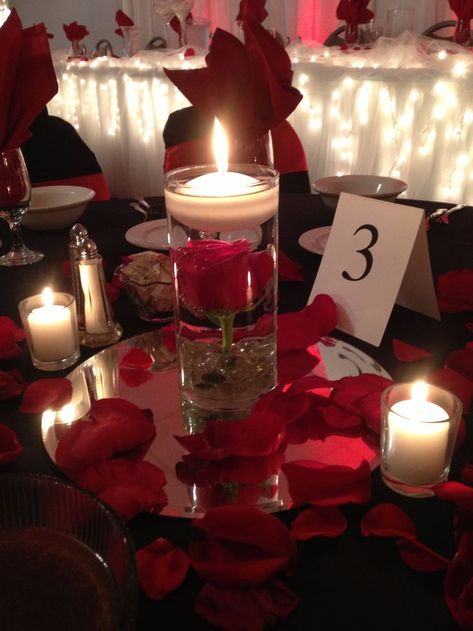 Lukas Wedding. Red Rose Centerpiece with floating candle. By Breezewood Floral Red Rose Wedding Theme, Roses Centerpieces, Red Roses Centerpieces, Rose Centerpieces Wedding, Rose Wedding Theme, Romantic Table Decor, Quinceañera Ideas, Floating Candle Centerpieces, Red And White Weddings