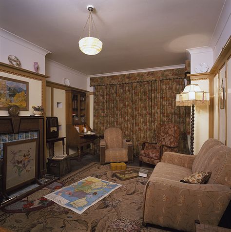 The 1940s House Living Room - a typical 1930s interior recreated for the 2001 TV series, and subsequently displayed (but, alas, no longer) at the Imperial War Museum, London 1930 Light Fixtures, 1940s House Aesthetic, 1940s Apartment New York, 40s Apartment, 40s Living Room, 1960 Living Room, 40s Interior Design, 1940s Curtains, 40s Interior