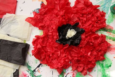 Kids can make puffy poppies by twisting or crumpling tissue paper just like we used to do in art class when we were kids. Great craft for all ages for Remembrance Day, Veterans Day or Anzac Day. #HappyHooligans #Poppy #Craft #Poppies #RemembranceDay #VeteransDay #AnzacDay #TissuePaper #Art #Kids #Toddlers #Preschoolers #ElementaryStudents Tissue Paper Poppy, Remembrance Day Activities, Remembrance Day Art, Poppy Craft, Floral Crafts, Preschool Art Projects, Key Stage 2, Kindergarten Art Projects, Paper Chain