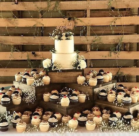 The Barns of Madison County on Instagram: "I would like one of each flavor please🙋🏼‍♀️🧁Such a beautiful cake and cupcake display @sweetblissbymelis #wedding #weddinginspiration #weddings #weddingdesserttable #weddingcupcakes #weddingcake #rusticwedding #rusticweddingdecor #vawedding #vaweddings #virginiaweddings #virginiawedding #barnwedding #barnweddingvenue #barnweddings #dessert #desserttable #cupcakedisplay #rusticdecoration #virginiaweddingvenue #virginia #pallet #palletproject #rustic" Rustic Cupcake Display, Rustic Wedding Cupcake Display, Cake And Cupcake Display, Wedding Cupcake Table, Rustic Wedding Desserts, Barn Wedding Cakes, Wedding Dessert Table Decor, Rustic Dessert Table, Rustic Cupcake Stands