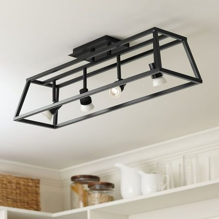 Upgrade in the kitchen or living area with this intriguing swiveling four-light cage track fixture. From Pro Track brand, the fixture features an open cage frame in a flat black finish to complement any decor. Its four lights swivel and adjust as needed so you can perfectly illuminate your space. The design installs into a ceiling junction box like any other ceiling light, but it has the functionality of track lighting. Mounting hardware is included with this lovely design. Size: 9 x 30 x 8.  Pa Ceiling Track Light, Small Kitchen Lighting, Black Track Lighting, Track Lighting Kitchen, Laundry Room Lighting, Track Lighting Fixtures, Black Cage, Track Light, Kitchen Ceiling Lights