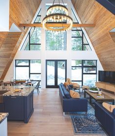 At Home in an A-Frame - Mountain Living A Frame House Interior, A-frame Interior, Classic White Kitchen, A Frame House Plans, Interior Minimalista, Phoenix Rising, A Frame Cabin, White Cabinetry, Rustic Contemporary