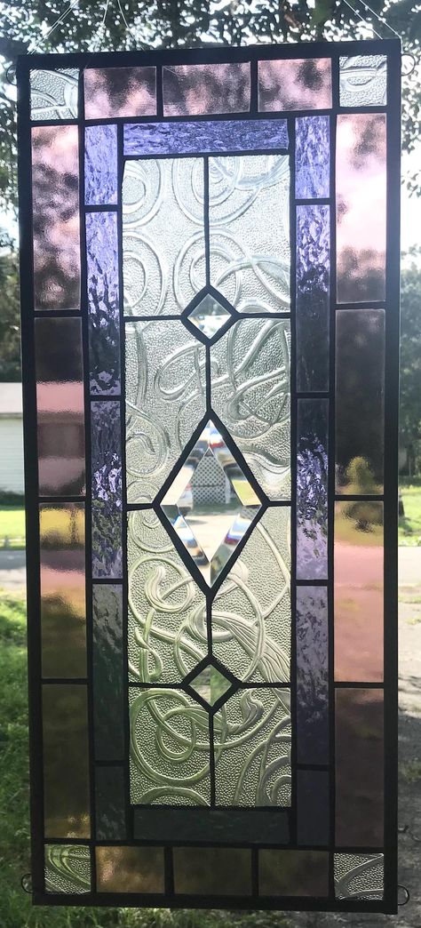 WELCOME to  Southern Star Stained Glass  in Vero Beach,  Florida CLASSIC STYLE   23" x 10"  Stained Glass Window Panel  $185 FREE SHIPPING - selling to lower 48 states only no returns - no custom work CLASSIC STYLE is a real stained glass window that actually will hang vertically or horizontally in your window!    There are 4 loops on the corners for easy hanging.   Pale wine and purple borders surround beautiful clear swirl glass, with three sparkling bevels down the center of the panel.     Ge Bedroom Stained Glass Window, Stained Glass Windows Aesthetic, Hanging Stained Glass Panels, Stained Glass Windows Patterns, Stained Glass Door Panel, Contemporary Stained Glass Panels, Stained Glass Modern, Stained Glass Transom Window, Art Nouveau Stained Glass