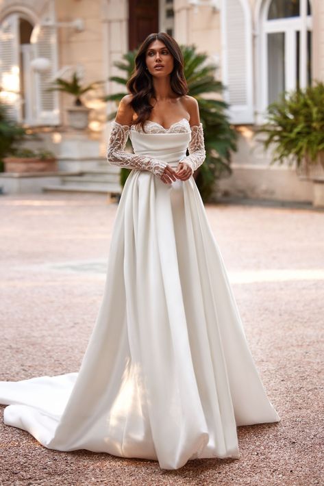 Meriann.An ivory A-line dress will help to create a perfect hip line and hide some nuances of the figure. The textured and dense Mikado fabric, of whi Sima Couture, Design Article, Anne Barge, Sophia Tolli, Classy Wedding Dress, Aline Wedding Dress, Lace Bride, White Wedding Dress, فستان سهرة