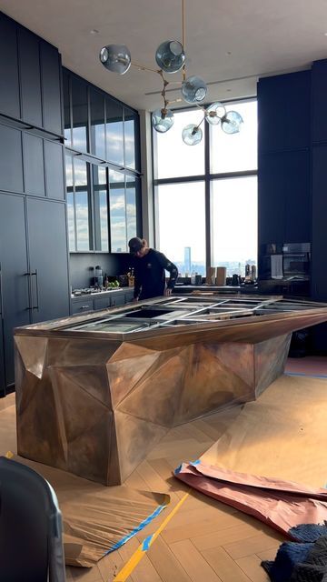 KJ Remodeling of NY on Instagram: "✨JUST INSTALLED ✨this incredible custom 3D shaped bronze island structure in our client’s new NYC Penthouse. This absolutely spectacular kitchen island design slowly comes to life. Have you ever see anything like this? Drop a comment below 👇😀👀🔥 Design: @builtinstudio GC: @kjremodeling 👉 Follow to see the progress! 😃 #kitchendesign #kitchendecor #kitchenisland #kitchengoals #kitchenremodel #kitcheninspiration #kitcheninspo #kitchenset #kitchenstyle #kitchenideas #kitcheninterior #kitchentrends #nyccontractor #nycgc #nycremodeling #generalcontractor #interiordesign #interiordesigner #nycinteriordecor #nycinteriorstyle #nycinteriordesigners #nycarchitect #nycarchitecture #nycapartments #nycrealestate #interiordecor #homedecor #homedesign #luxuryhomes # Sculptural Kitchen Island, Massive Kitchen Island, Nyc Penthouse Kitchen, Range In Island, High Tech Kitchen, Penthouse Kitchen, Massive Kitchen, Montana House, Nyc Penthouse