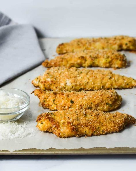 Crunchy Italian-Style Parmesan Chicken Tenders | Worn Slap Out Chicken Tenders Oven, Panko Chicken Tenders, Baked Chicken Tenderloins, Crunchy Chicken Tenders, Italian Bread Crumbs, Bread Crumb Chicken, Baked Breaded Chicken, Parmesan Chicken Tenders, Crusted Chicken Tenders