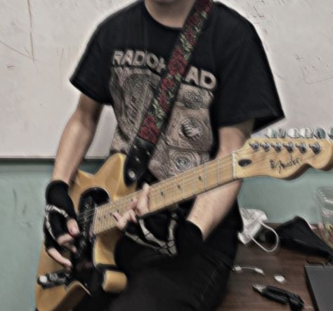 alt boy holding a guitar wearing a radiohead shirt Rockstar Man Aesthetic, Guitar Band Aesthetic, Men With Guitar Aesthetic, Rockstar Boy Aesthetic, Band Boy Aesthetic, Rock Boy Aesthetic, Band Aesthetic Rock, Guitarist Boy, Guy Guitar Aesthetic