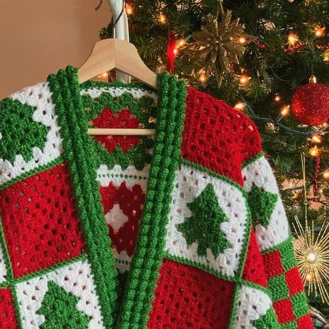 Crochet Bao on Instagram: "this might just be my new favorite creation 🎄✨ as someone who absolutely LOVES christmas and the coziness of this time of the year, this design is super special to me since I think it just captures all the warmth and joy of the holidays ♥️ thank you guys for all the love and support you’ve given it 🥰 it truly means so much to me if you want to make your own, feel free to grab a copy and also enjoy a special discount with the code “TISTHESEASON” #christmascrochet #crochetclothing #crochetinspiration #crochetcardigan #holidayfashion #crochetchristmastree #grannysquares #cozycrochet #handmadeclothes #holidaycrafts #christmasfashion #handmadewithjoann" Christmas Granny Square Cardigan, Crochet Christmas Cardigan Pattern, Crochet Christmas Granny Square Sweater, Crochet Sweater Christmas, Ugly Sweater Crochet, Christmas Sweaters Crochet, Crochet Christmas Jumper, Crochet Christmas Clothes, Crochet Christmas Sweater Pattern Free