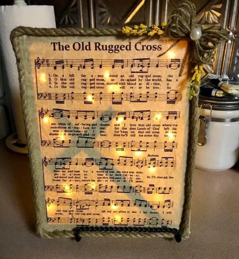 Crafts With Music Sheets, Hymnal Crafts Diy, Diy Crosses Ideas Crafts, Crafts Made From Old Hymnals, Crafts Using Hymnal Pages, Old Hymnal Crafts, Hymnal Page Crafts, Crafts Using Old Hymnal Pages, Christmas Crafts With Hymnal Pages