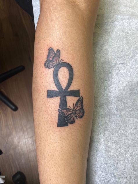 Ankh #tattoo Butterfly Ankh Tattoo, Ankh Tattoo With Flowers, Ankh Arm Tattoo, Ankh Tattoo Women Black Art, Ankh Butterfly Tattoo, Anhk Tattoos For Black Women, Ahnk Tattoo Black Woman, Ahnk Tattoo Stencil, Ankh Nails