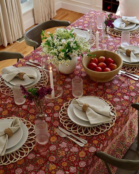 A tablescape blooming in color 💐 Crafted in the rich tradition of Indian block printing, our Annalise Tablecloth is made by artisans who use carved wood to press floral motifs onto pure cotton. @Steviemaxine paired it with our rattan chargers and Mason Dinnerware to complete her inviting summer table. #MyPotteryBarn Rattan Placemats Table Settings, Hyacinth Placemat Setting, Rattan Table Mat Wedding, Rattan Placemats Table Settings Bohemian, Indian Block Printing, Whicker Placemats, Rattan Charger, Summer Table, Indian Block Print